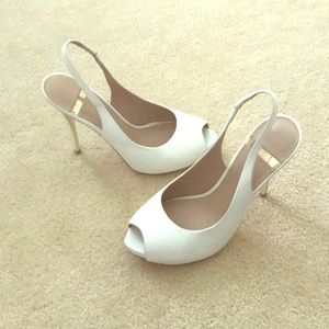 Marciano white peep toe pumps